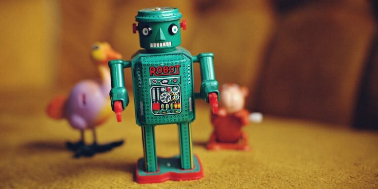 green metal toy robot