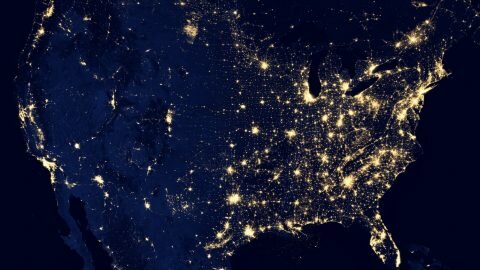 aerial photo of the world at night lit up